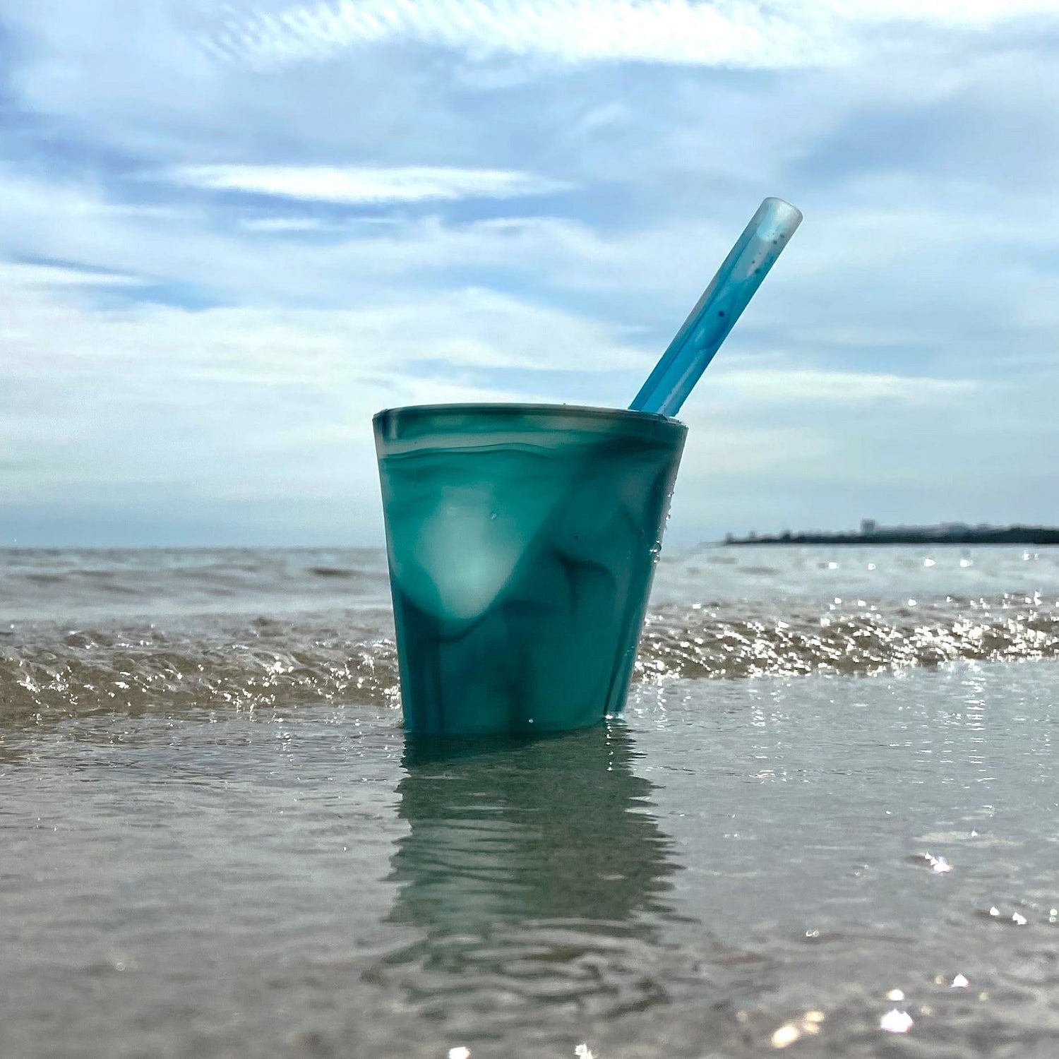 Dishwasher-safe GoSili cup with stackable design for easy storage.
