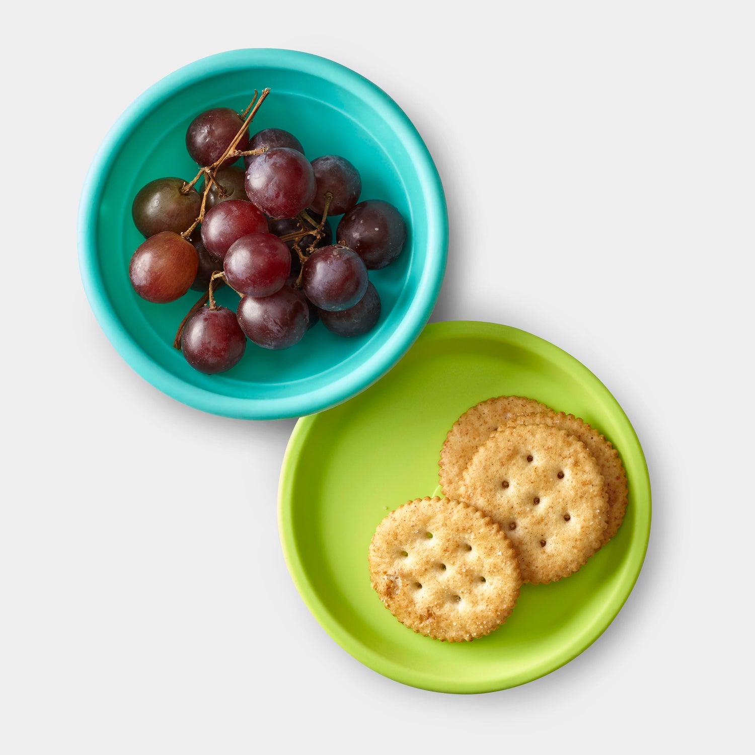 Family using GoSili silicone bowl and lid for meal prep and food storage.
